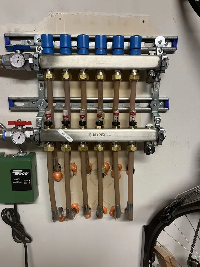 Plumber performing Water Heater Repair at a residential property in Downers Grove